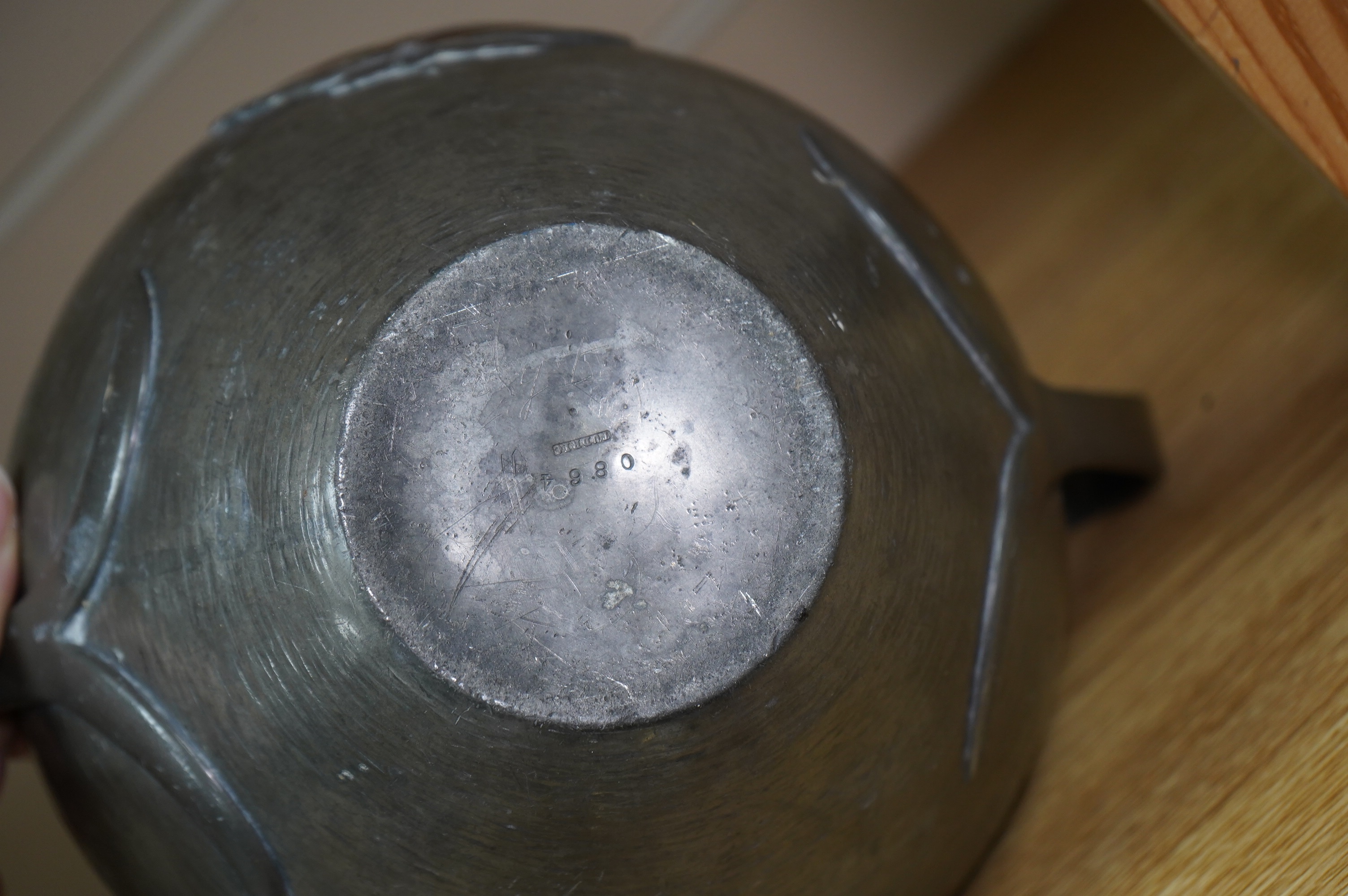 Oliver Baker for Liberty & Co, a Tudric pewter and copper vase, no.0864, c.1910, 25cm wide. Condition - fair to good